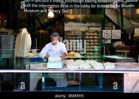 A man working in a bakery. San Francisco, California, USA. Stock Photo
