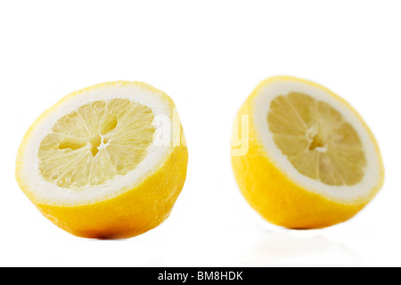 focus on one half lemon in front of another half lemon Stock Photo