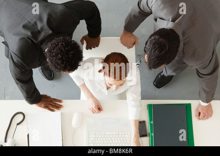 Business associates collaborating on project Stock Photo