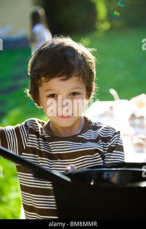 Boy with magic wand and magician's hat, portrait Stock Photo