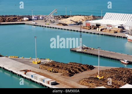 Logs stacked up in the Port of Napier in New Zealand Stock Photo