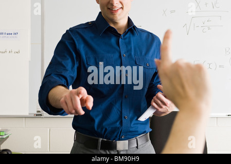 Teacher answering student's question Stock Photo
