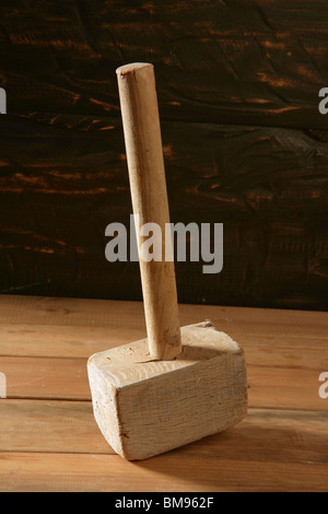 hammer old vintage wooden made over wood background Stock Photo