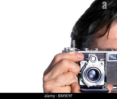 Man with camera taking a picture Stock Photo