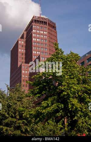 Kollhoff Tower at Potsdamer Platz, Germany, rising above the trees Stock Photo