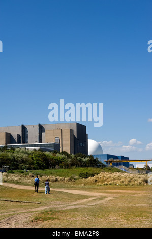 People walking past Sizewell B Power Station in Suffolk. Stock Photo
