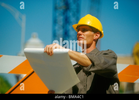 Architect on construction site. Stock Photo