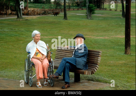 Older couple enjoy a day at the park. Stock Photo