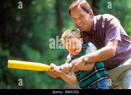 Boy learning how to play baseball. Stock Photo