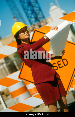 Woman, architect on construction site. Stock Photo