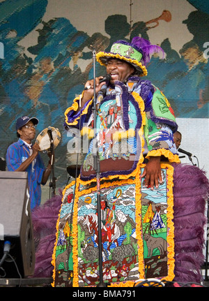 A Mardi Gras Indian performing at the New Orleans Jazz & Heritage Festival. Stock Photo