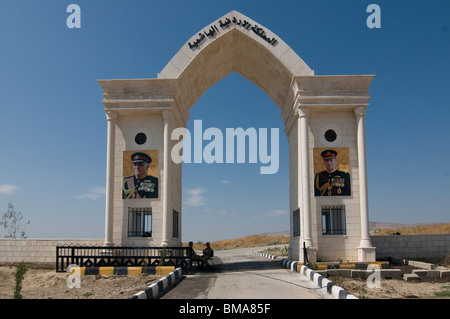 Gateway decorated with figures of King Hussein and King Abdullah in Al