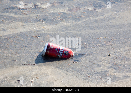 empty can of beer floating on water Stock Photo