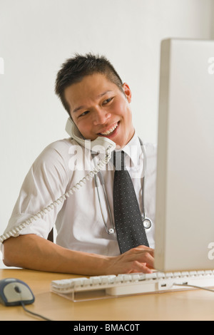 Businessman Talking on Telephone Stock Photo