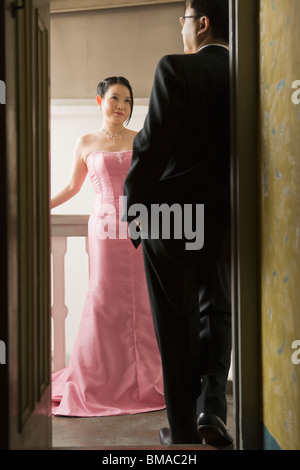 Couple Standing at Door Stock Photo