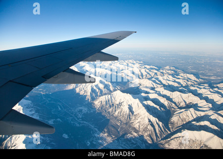 Airplane Flying Over Rocky Mountains, Banff National Park, Alberta, Canada Stock Photo