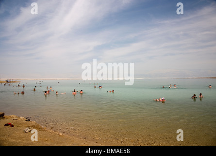 Dead Sea Bathers - Israel - with Jordan on horizon Stock Photo