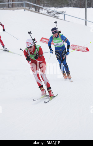 Weronika Nowakowska & Marie Dorin Women 10km Pursuit IBU World Cup Biathlon Kontiolahti Finland March 14 2010 Photo: ROB WATKINS Stock Photo