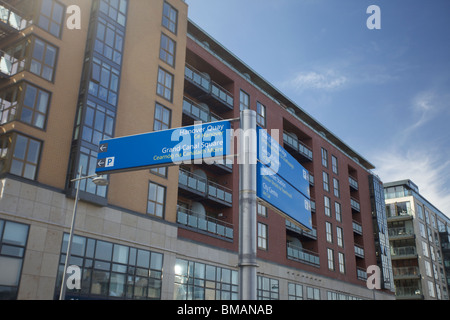 Street signs indicating the way to Grand Canal Square, Dublin Docklands,   and Hanover Quay in Dublin Ireland Stock Photo