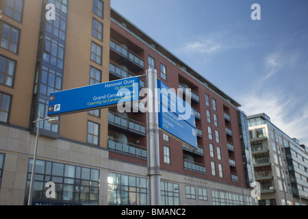 Street signs indicating the way to Grand Canal Square, Dublin Docklands,   and Hanover Quay in Dublin Ireland Stock Photo