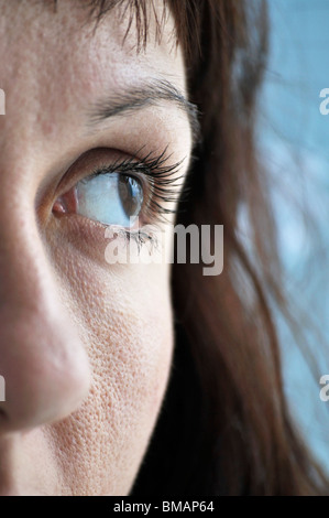 Close-up of womans eye looking up Stock Photo