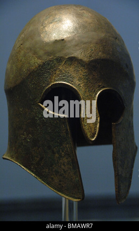 Bronze helmet of Corinthian type. Olympia Archaeological Museum. Ilia Province. Peloponnese region. Stock Photo