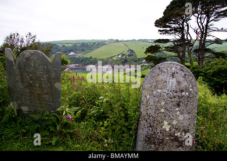Grave of William Northcott in the grounds of Tallands Parish Church, overlooking the bay Stock Photo