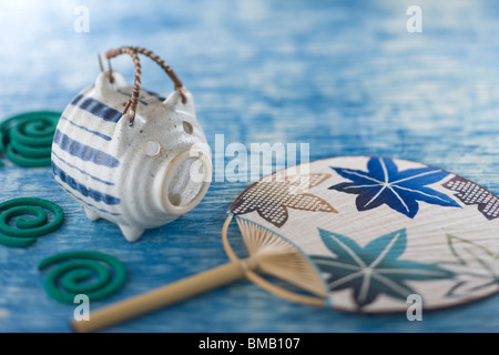 Mosquito Coil and Pig-shaped Container Stock Photo