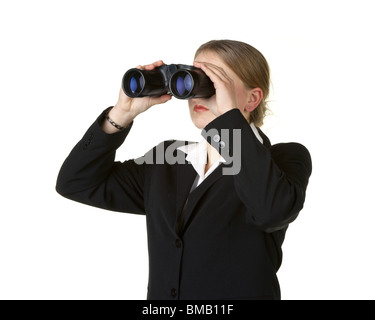 young business woman looking through binoculars isolated on white background Stock Photo