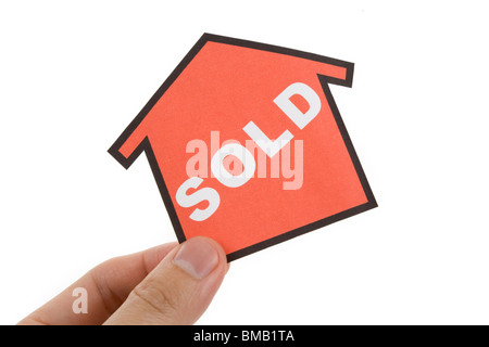 a red home sign, Real Estate Concept Stock Photo