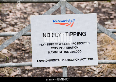 Network Rail no fly tipping sign on a gate in England Stock Photo