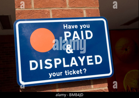 Have you paid and displayed your ticket sign in a car park in England. Stock Photo