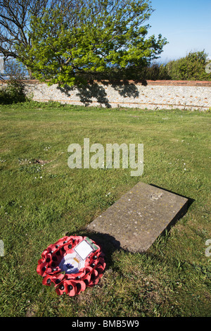 A monument stone for the sailors of HMS Invincible, wrecked off the coast of Happisburgh. Stock Photo