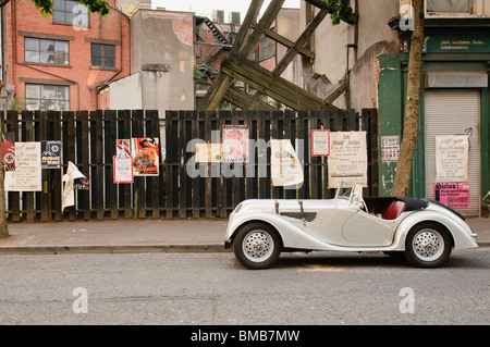 BMW 328 roadster from the latter half of the 1930s on a film set recreating Berlin in the mid 1930s with Nazi propaganda posters Stock Photo