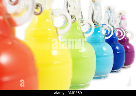 Six Bottle set full of Colored water Stock Photo