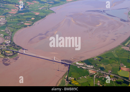 Aerial view of the 1 mile wide Severn Bridge which carries the M48 motorway between England and Wales seen here at low tide. Stock Photo