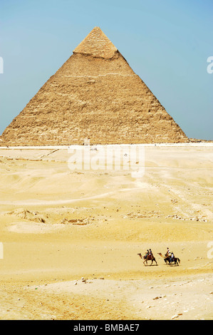early morning camel ride , Pyramids of giza, Giza Necropolis bordering what is now El Giza, cairo , egypt Stock Photo