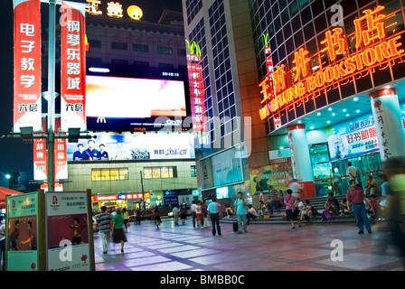 Beijing, China -Large Crowd People, 'Wangfujing Street' Busy Shopping Area, Lit up at Night, busy streets beijing General View with Outdoor Advertising outdoor lights, BEIJING shopping district Stock Photo