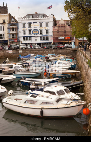 UK, England, Devon, Dartmouth, Boat Float small leisure craft moored in front of Royal Castle Hotel Stock Photo