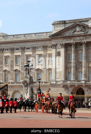 Royal Coach and Horses leave Buckingham Palace in London Stock Photo