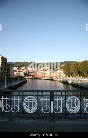 Bridge over the River Nervion in Bilbao and view of the riverside Campo Volantin walkway Stock Photo