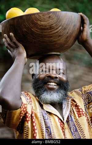 Bearded Man with Bowl of Fruit Stock Photo