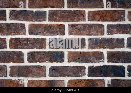 brick wall - periodic whites line on old brick Stock Photo