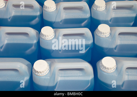 Plastic bottles of blue screen wash. Stock Photo