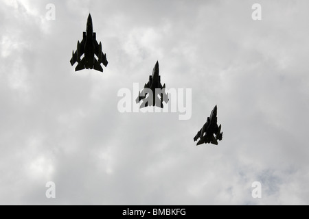 After arriving back in the UK three RAF Tornados fly past in formation. Stock Photo