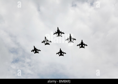 After arriving back in the UK six RAF Tornados fly towards the lens in formation.