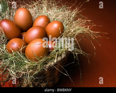 Naturally dyed easter eggs in the basket. Stock Photo