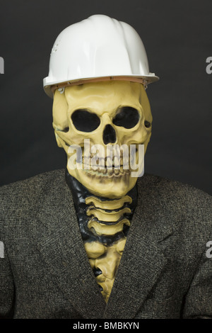 Terrible dude in a mask of the skeleton with a protective helmet Stock Photo