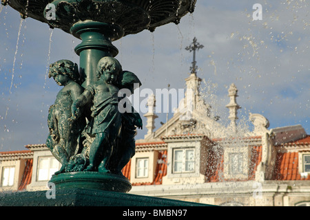 fountain on the square Praca de Dom Pedro IV or Rossio in Lisbon, Portugal, Europe Stock Photo