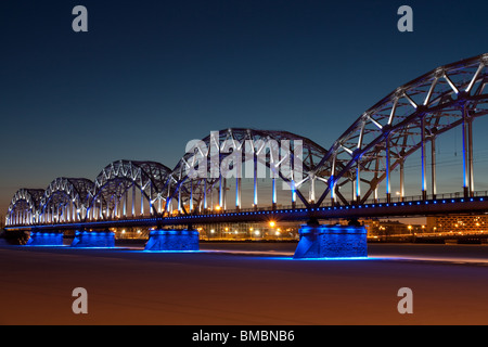 Railway bridge at night in winter Stock Photo